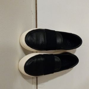 UGG Woman's black leather shoes.